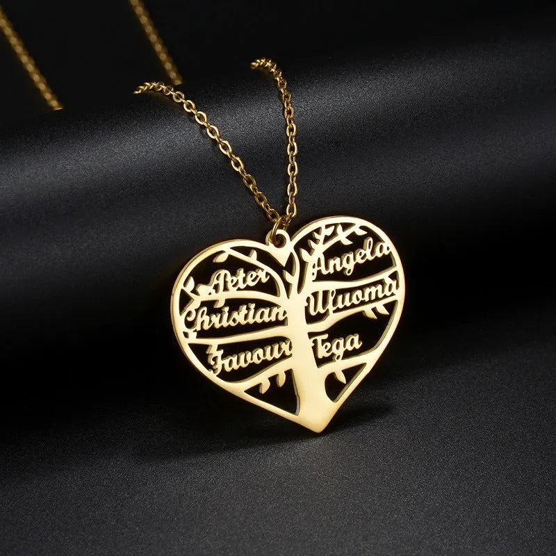 Personalised stainless steel name necklace with hollow heart and tree design pendant on an adjustable chain.