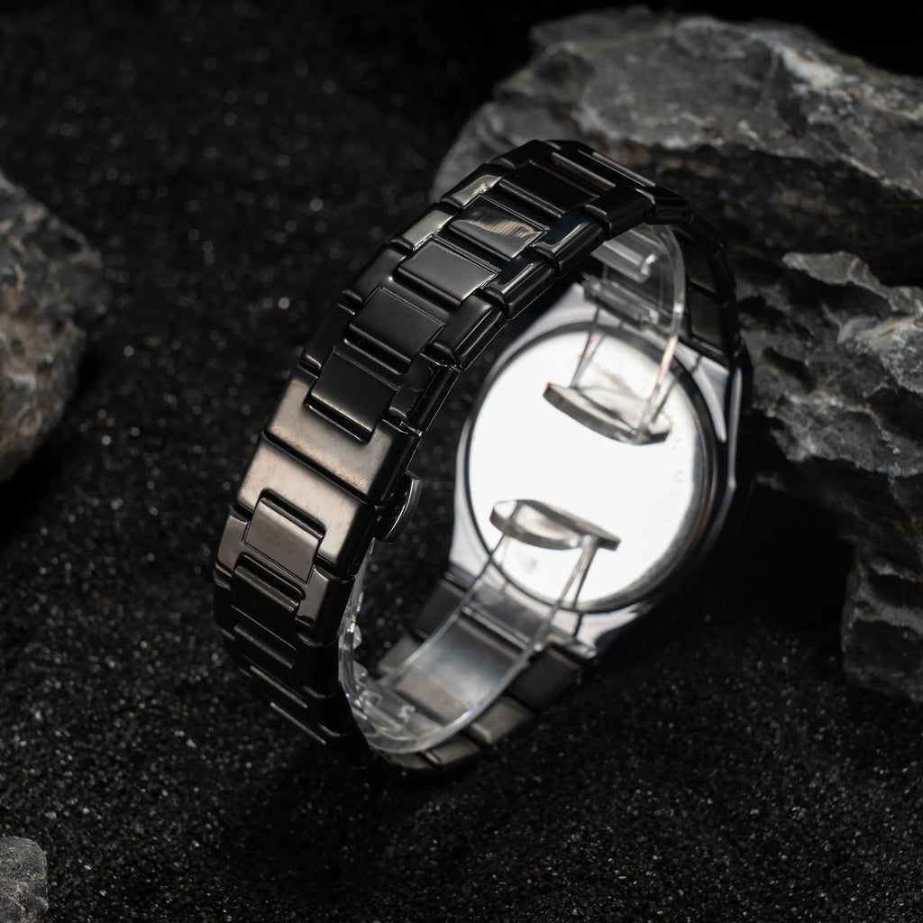 Men's business casual stainless steel quartz watch showing three colour options on wrist.