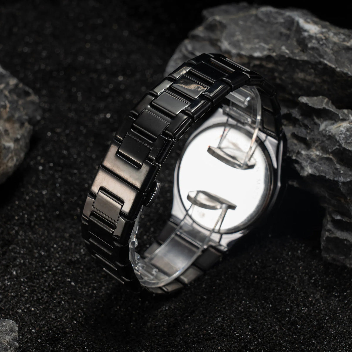Men's business casual stainless steel quartz watch showing three colour options on wrist.