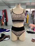 Women's high waist split bikini swimsuit in leopard print or white colours with nylon fabric