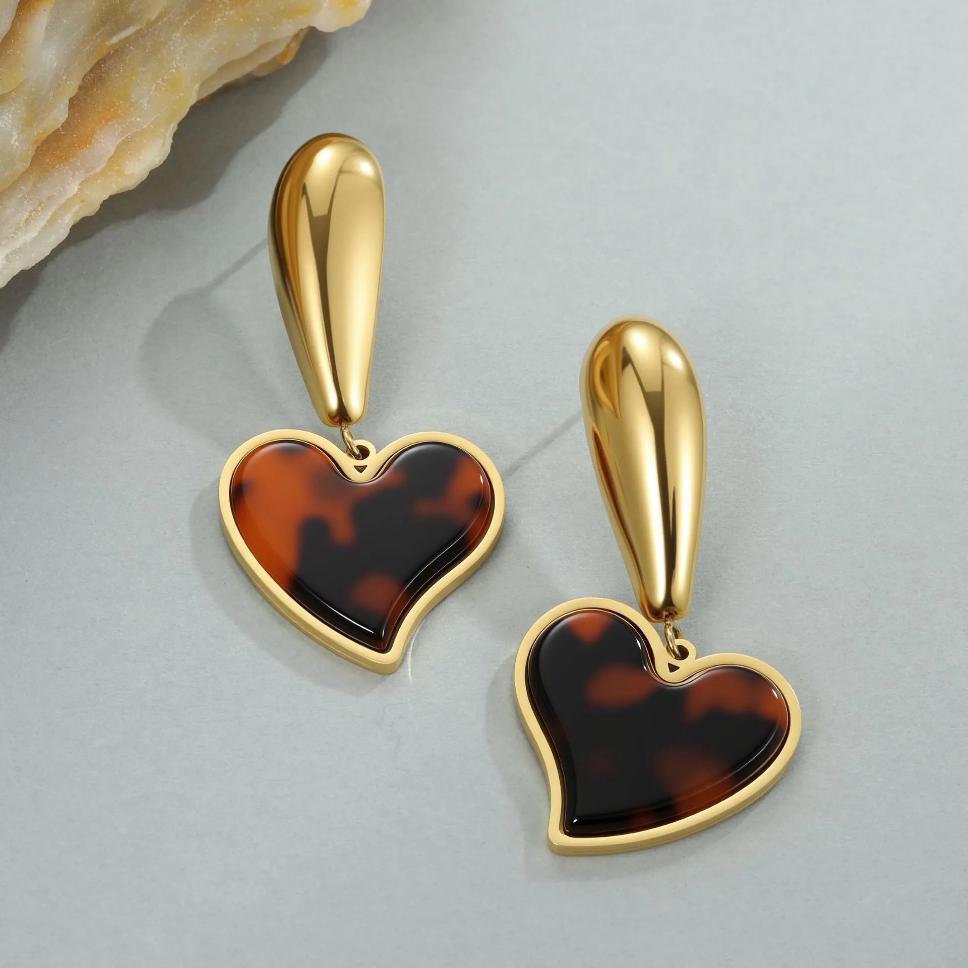 Tortoiseshell resin hawksbill colour earrings with 18K gold plating on stainless steel, showing heart and flower geometric designs