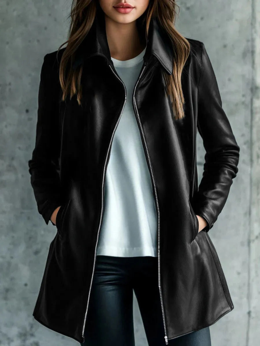Black women's leather-style jacket medium length with long sleeves on hanger