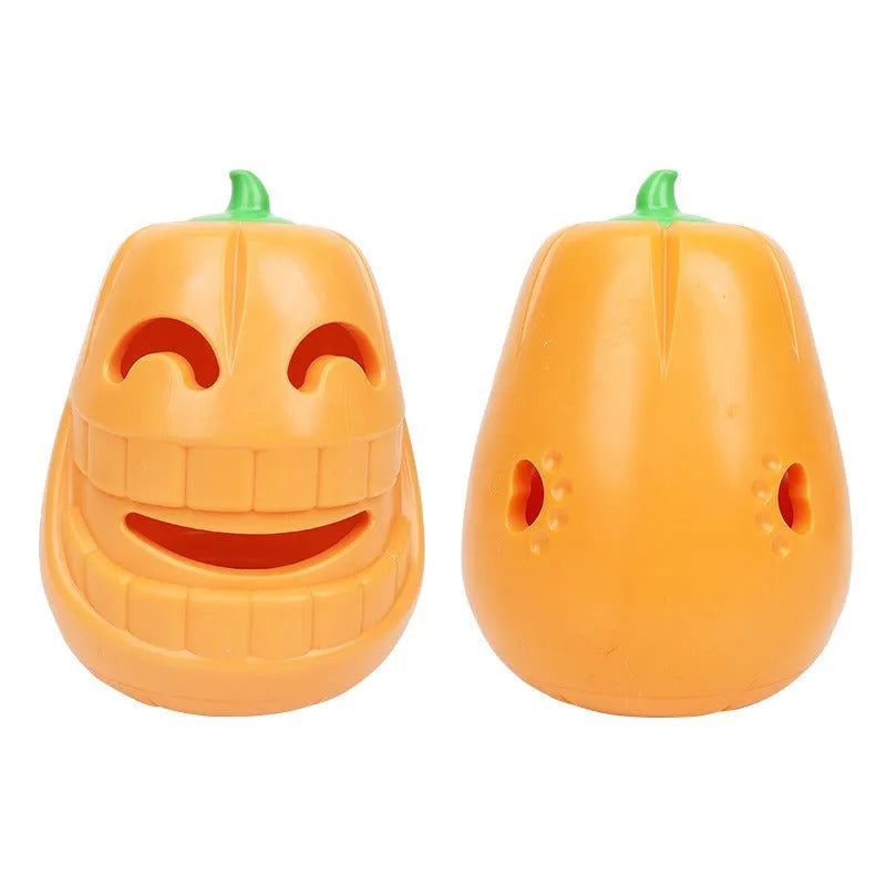 Orange Halloween pumpkin shaped dog chew toy with a treat-dispensing funnel opening.