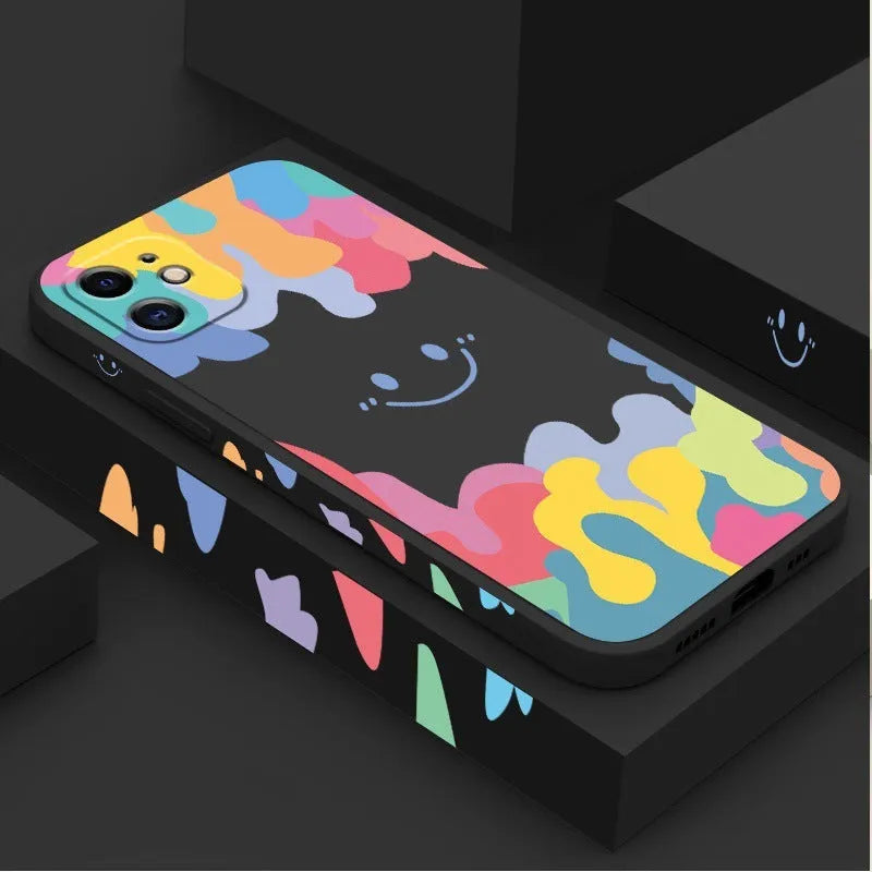 Rainbow smiley face print TPU phone case with attached lanyard in white or black colour options