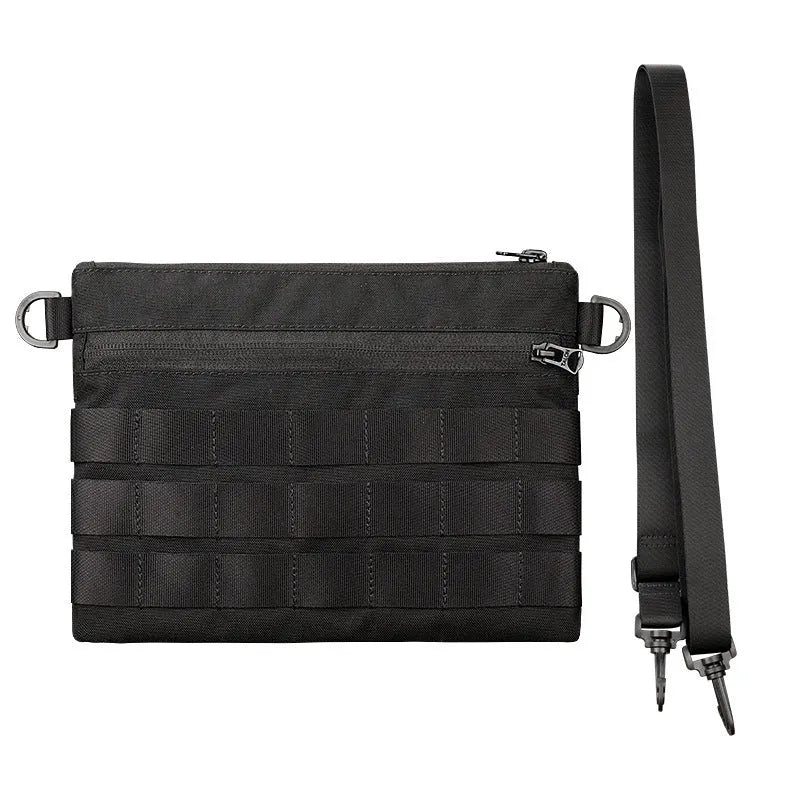 Black Oxford cloth military kit bag showing compact 18cm by 3.5cm size.