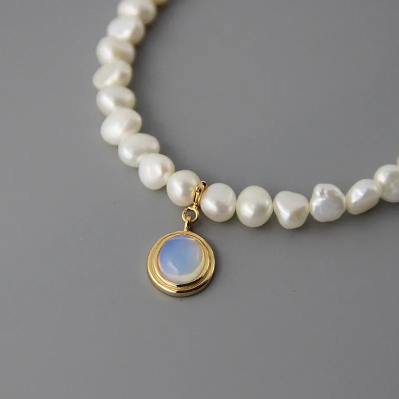 Adjustable sterling silver pearl necklace with irregular geometry and extension chain