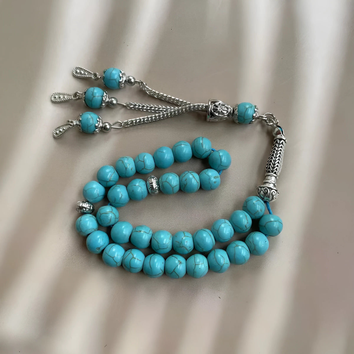 Sky blue stone bead Muslim prayer bracelet with adjustable knot on wrist