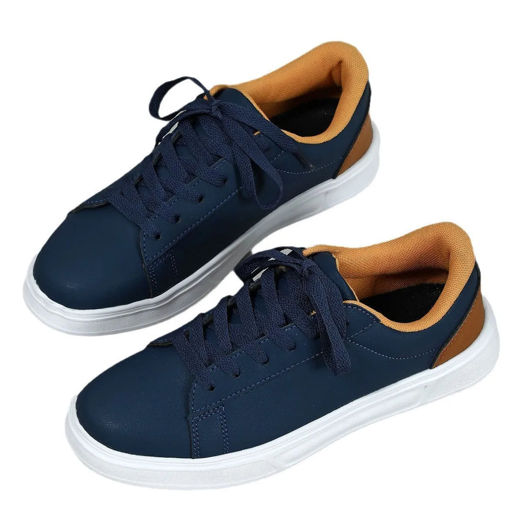 Women's platform skateboard sneakers with cross-strap detailing and mid-heel sole