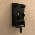 Retro-style white mechanical light switch panel for exposed wall mounting.