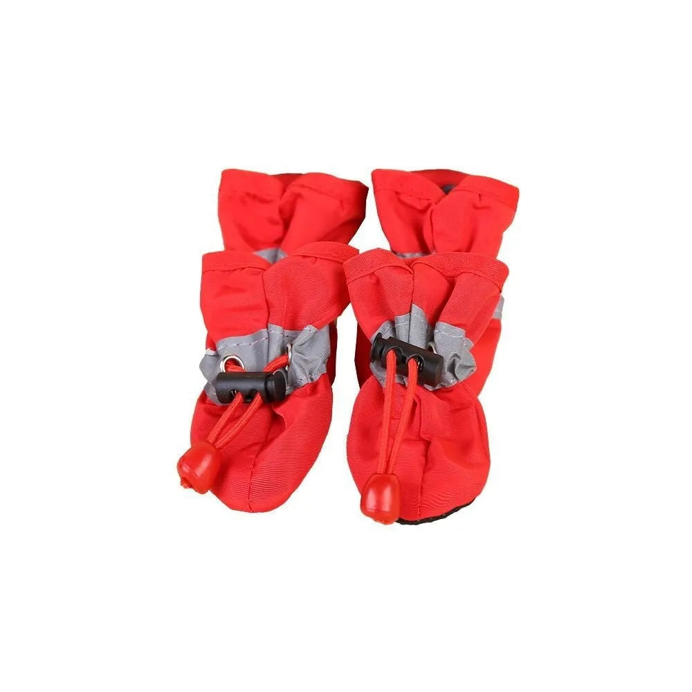 Set of four cloth dog shoes in various colours including fleece-lined red and monkey patterns