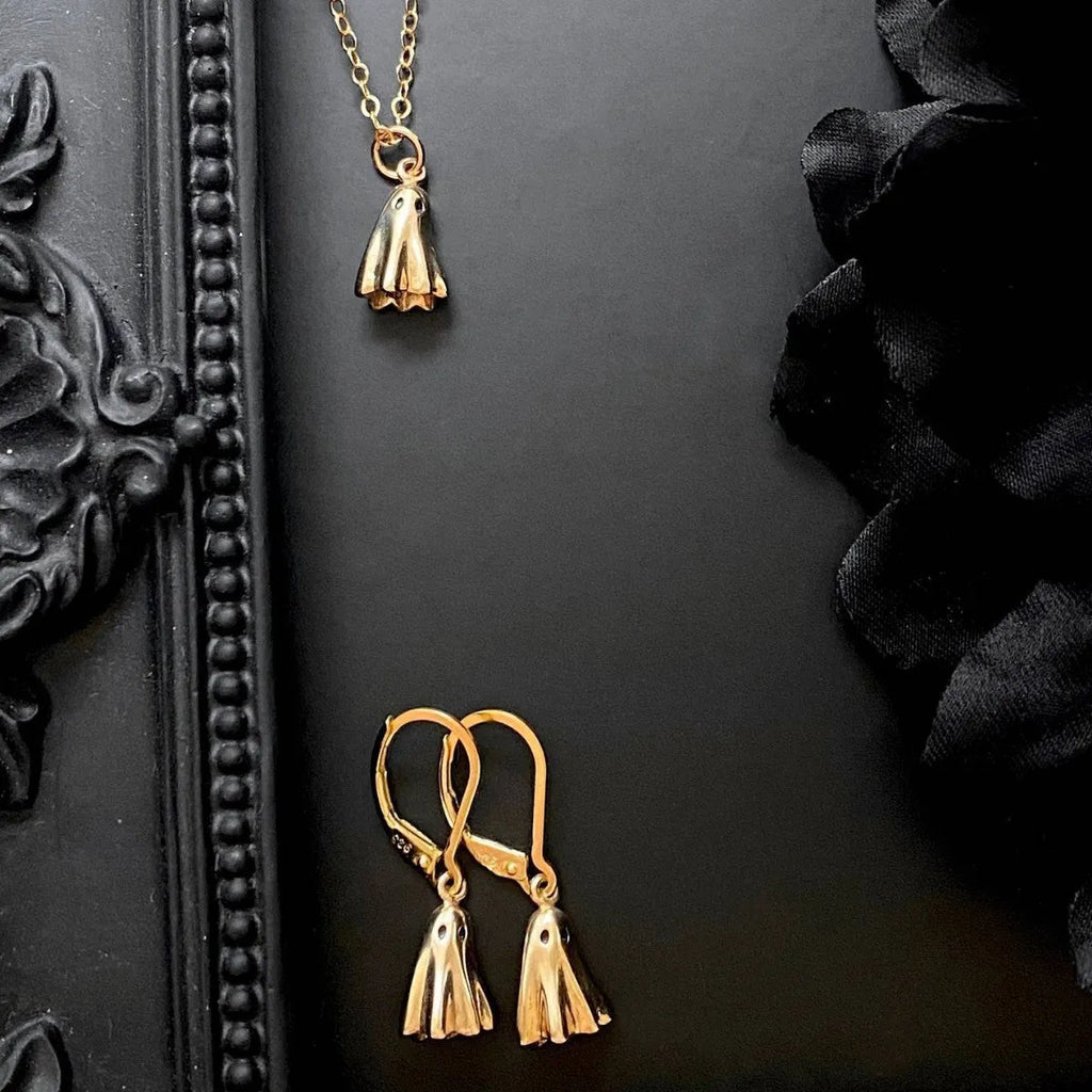 A titanium steel ghost pendant necklace on a choice of stainless steel chain styles.