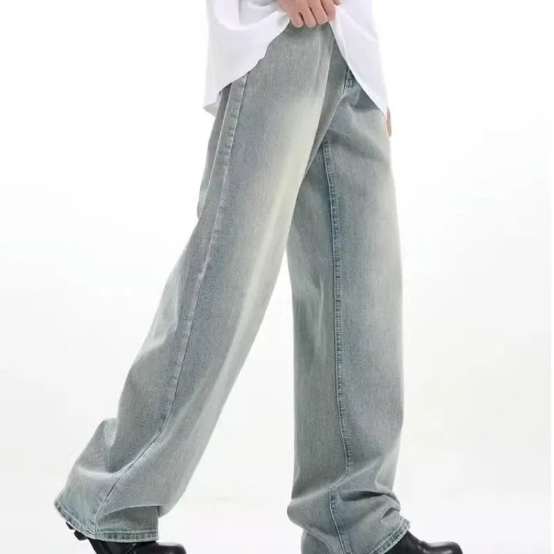 Blue loose retro-style casual trousers on a hanger, showing elasticated waist and rabbit fur fabric.