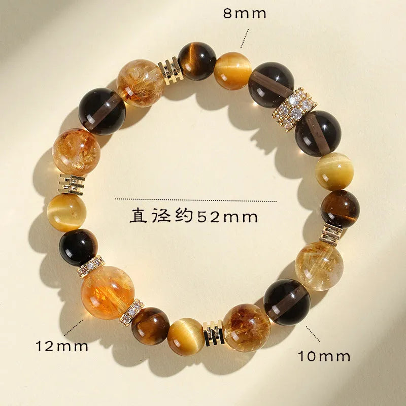 Natural yellow 10mm Jinba crystal beads on a handmade wrap bracelet.