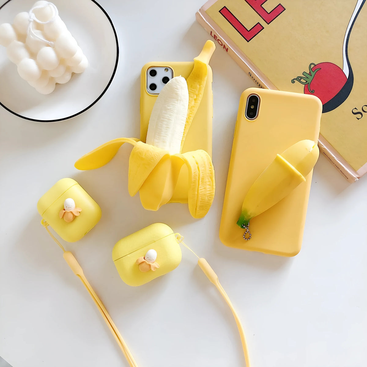 IMD solid colour iPhone case featuring a large open banana graphic, compatible with multiple iPhone models.