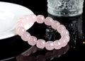 Pink bamboo crystal barrel bead bracelet with geometric design on wrist