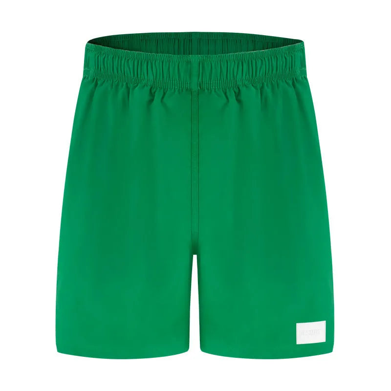 Men's quick-dry sports shorts in nylon fabric available in four colours with straight leg design