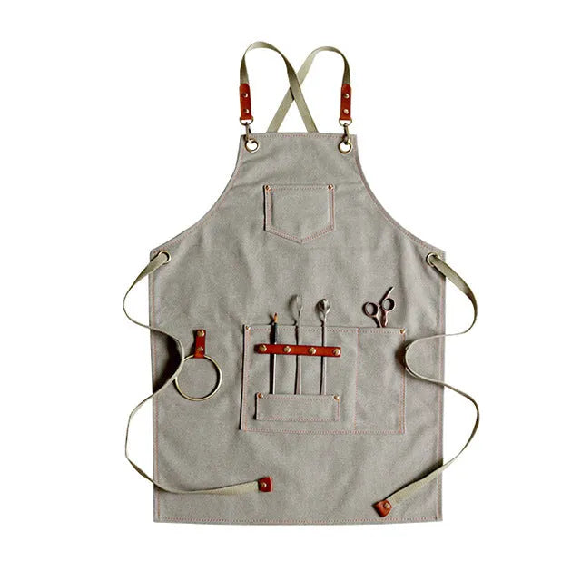 Canvas apron with cross strap back design in camel colour for baking and gardening protection