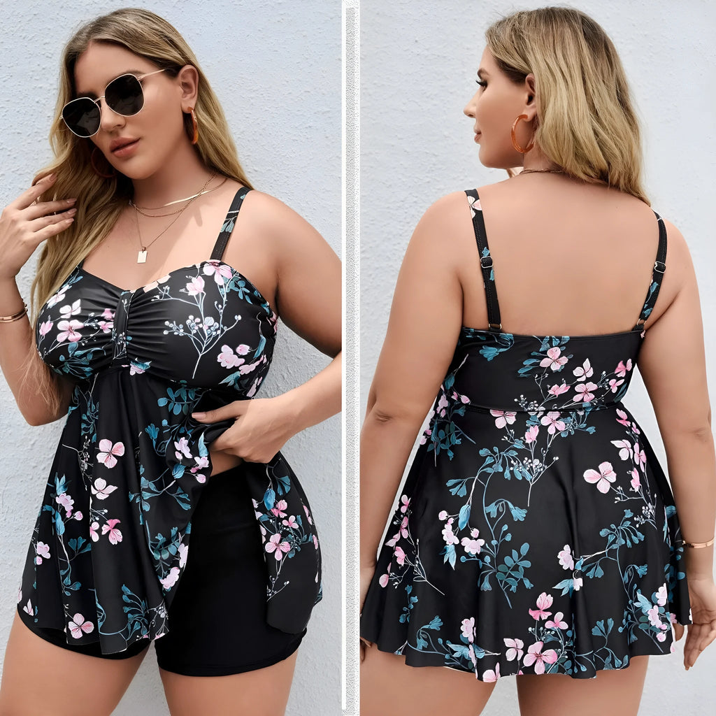 Women's floral print one-piece swimsuit on a hanger, showing split colour design
