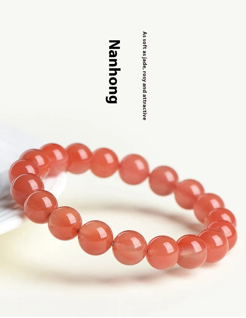 Natural South Red Cherry Agate scattered bead bracelet showing cherry red colour and polished surface