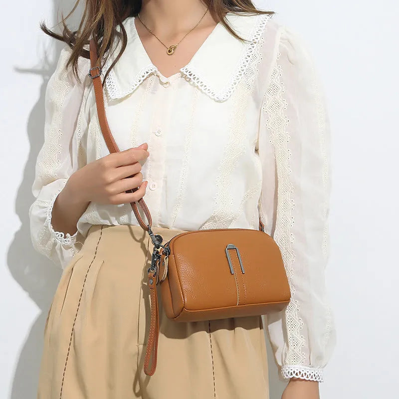 Women's genuine leather shoulder bag in horizontal square shape showing five colour options