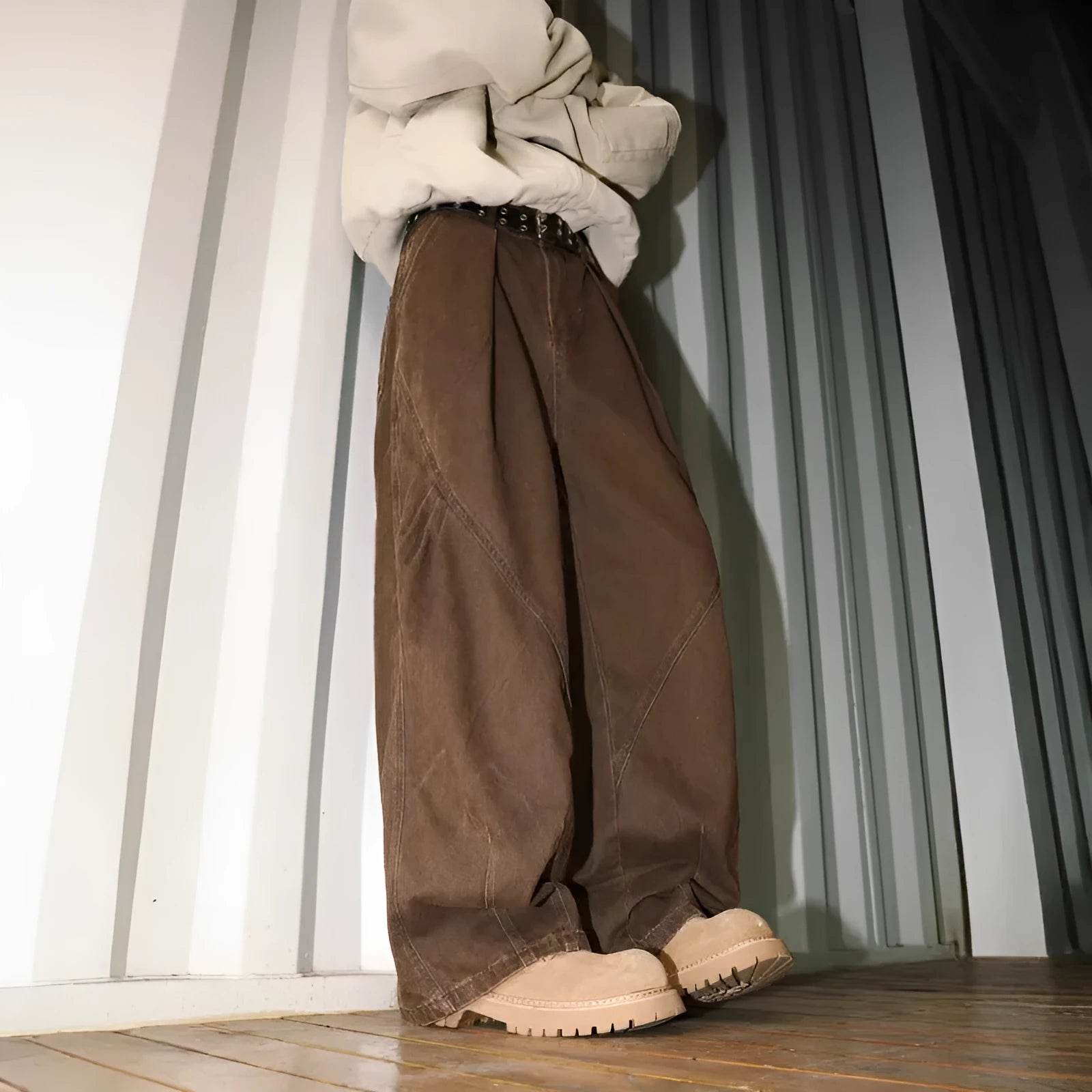 Men's loose straight leg trousers with pleats and stripes in apricot, black, and brown colours