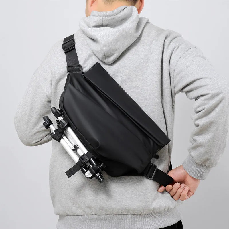 Grey medium crossbody bag with zip opening and shoulder strap