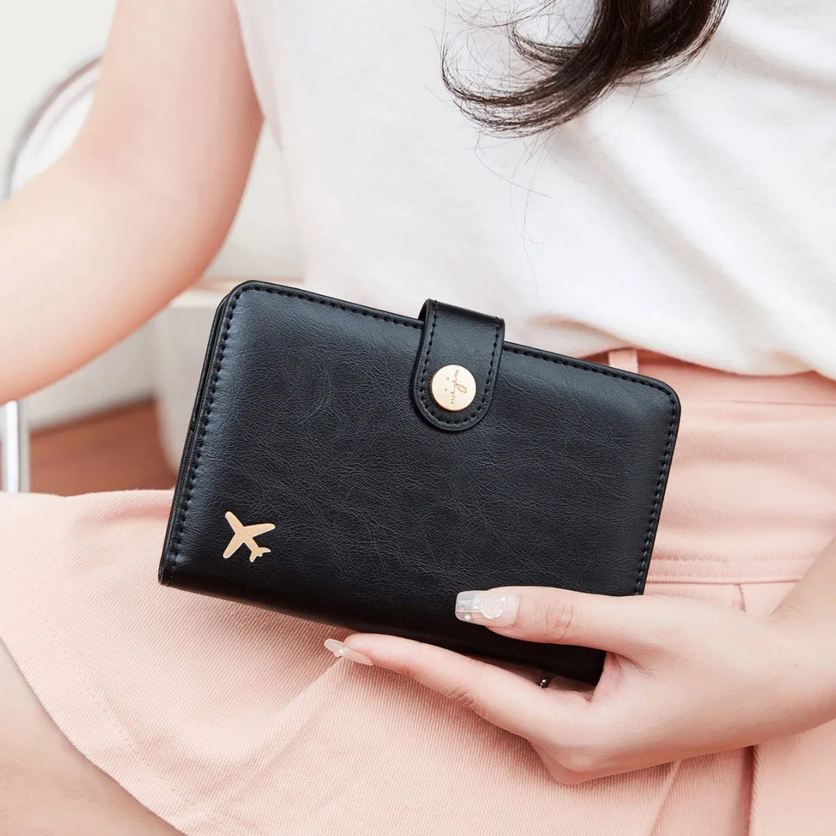 PU leather multifunctional passport holder wallet in various colours showing sewing line detail and anti-theft protection.