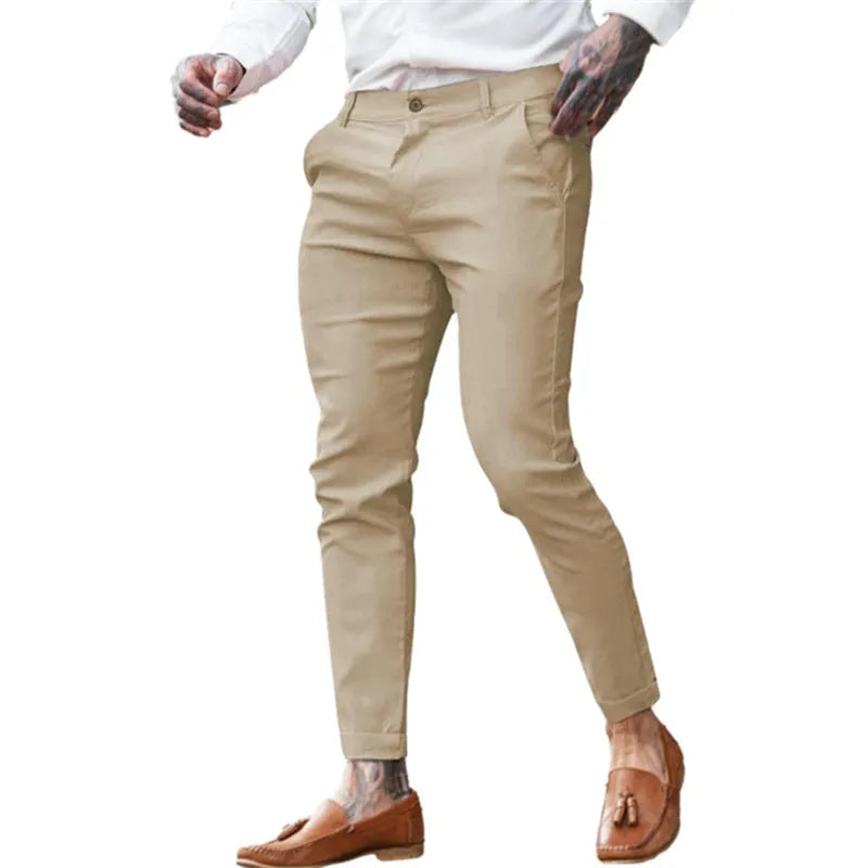 Men's slim fit pencil trousers in cotton twill fabric with stretch, showing zipper fly and mid-waist design