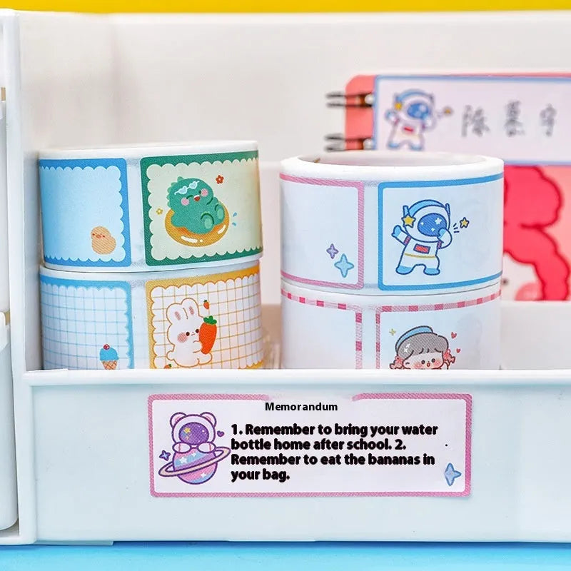 Roll of cartoon tape stickers with dinosaur, astronaut, rabbit, and girl designs for student labelling
