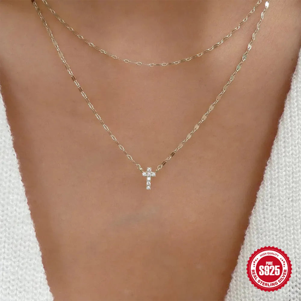 S925 sterling silver double layer twin diamond cross pendant necklace on a clavicle chain.