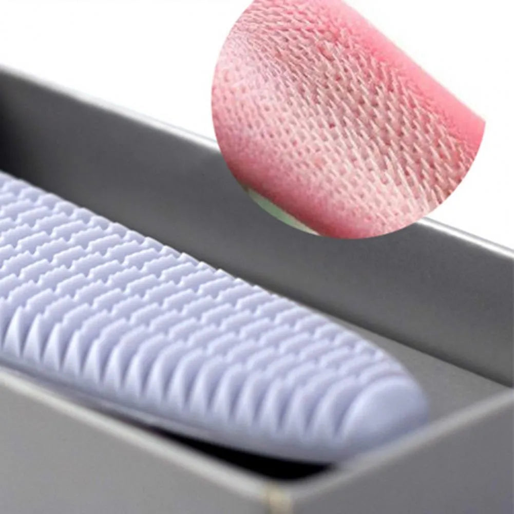 Grey ABS plastic cat comb with tongue massager design showing narrow and wide ends for pet grooming