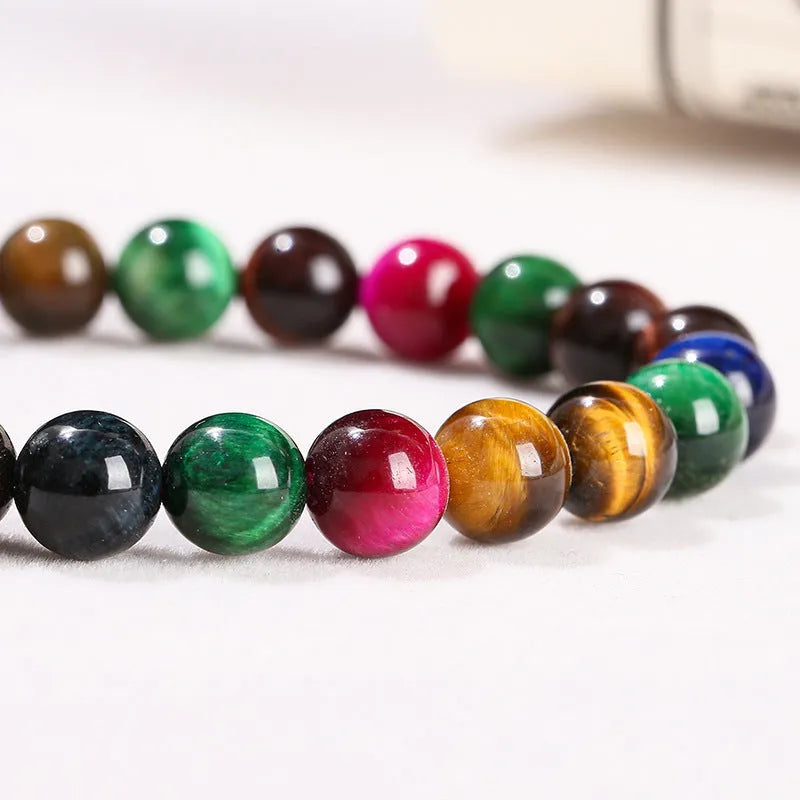 Geometric colourful Tiger Eye gemstone bracelet showing mixed natural colours on a string, available in multiple bead sizes.