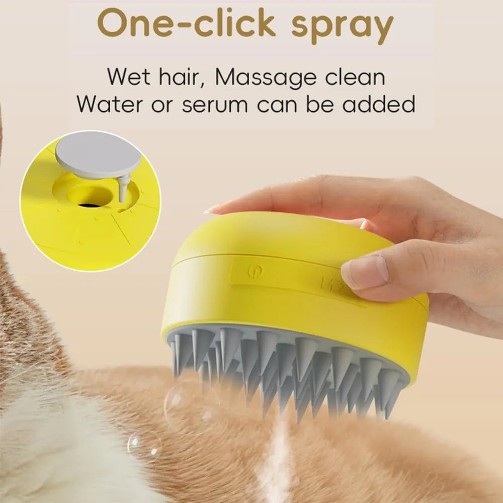 Green and yellow rechargeable cat dog steam brush with silicone head on a white background.