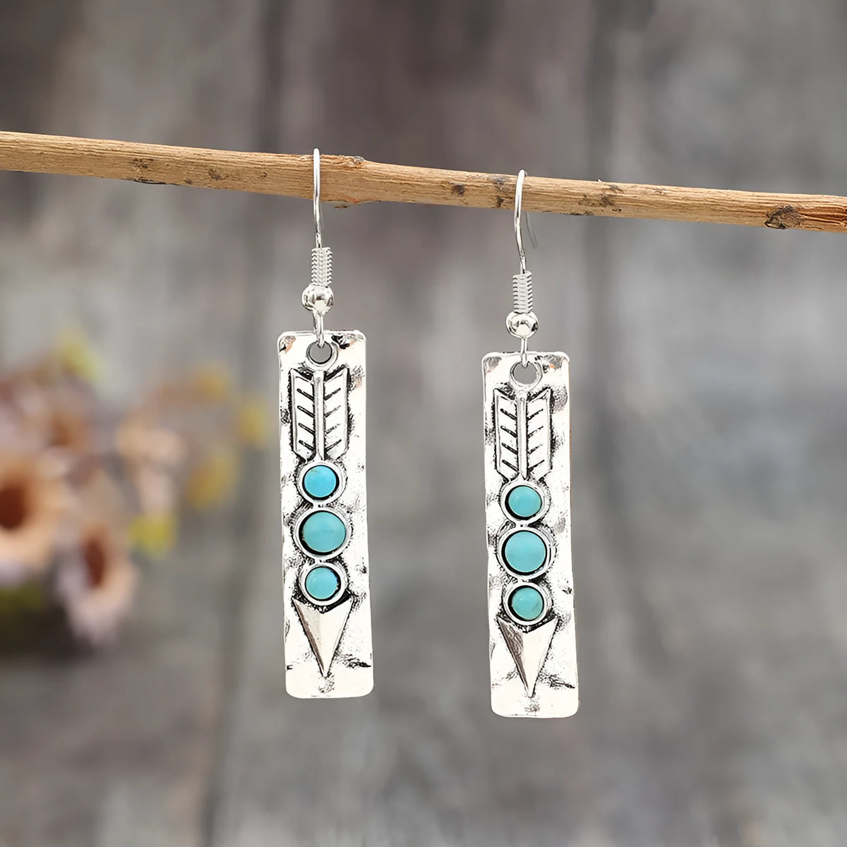 Long geometric silver earrings with turquoise inlays, zinc alloy construction