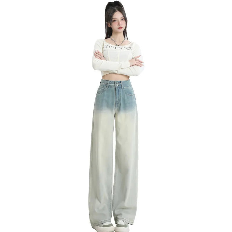 Women's straight-leg denim trousers in a gradient blue colour with a wide leg fit.