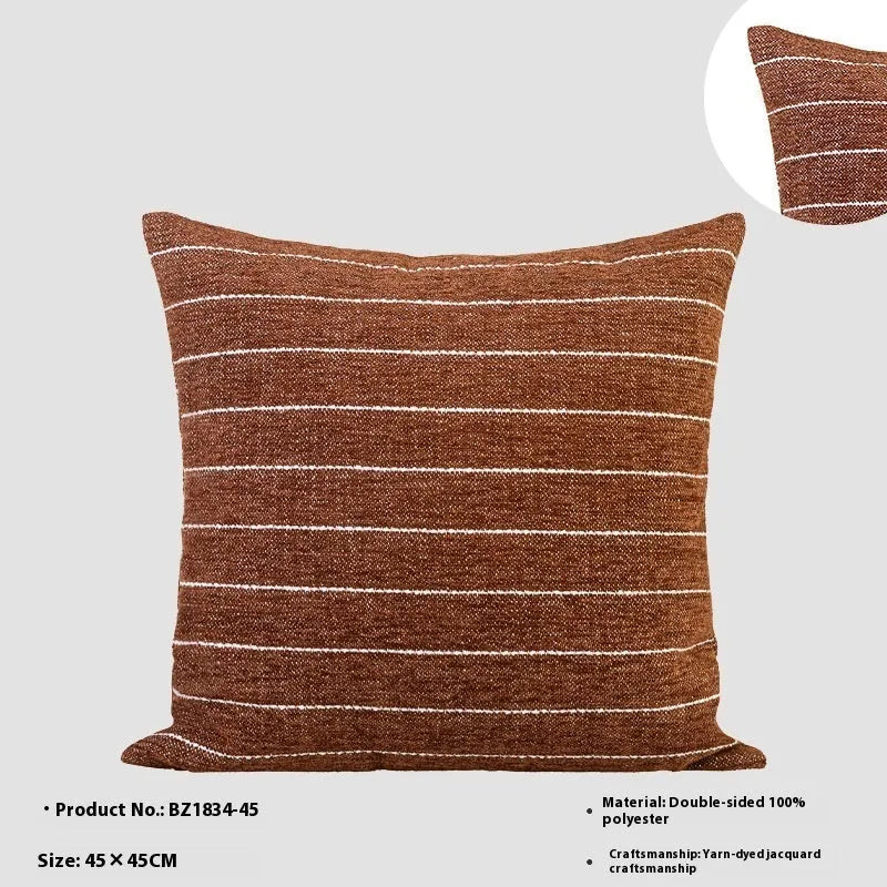 Chinese style square cushion with Maillard colour geometric patterns on living room sofa