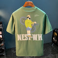 Green loose fit men's t-shirt with trendy printed design on short sleeves.