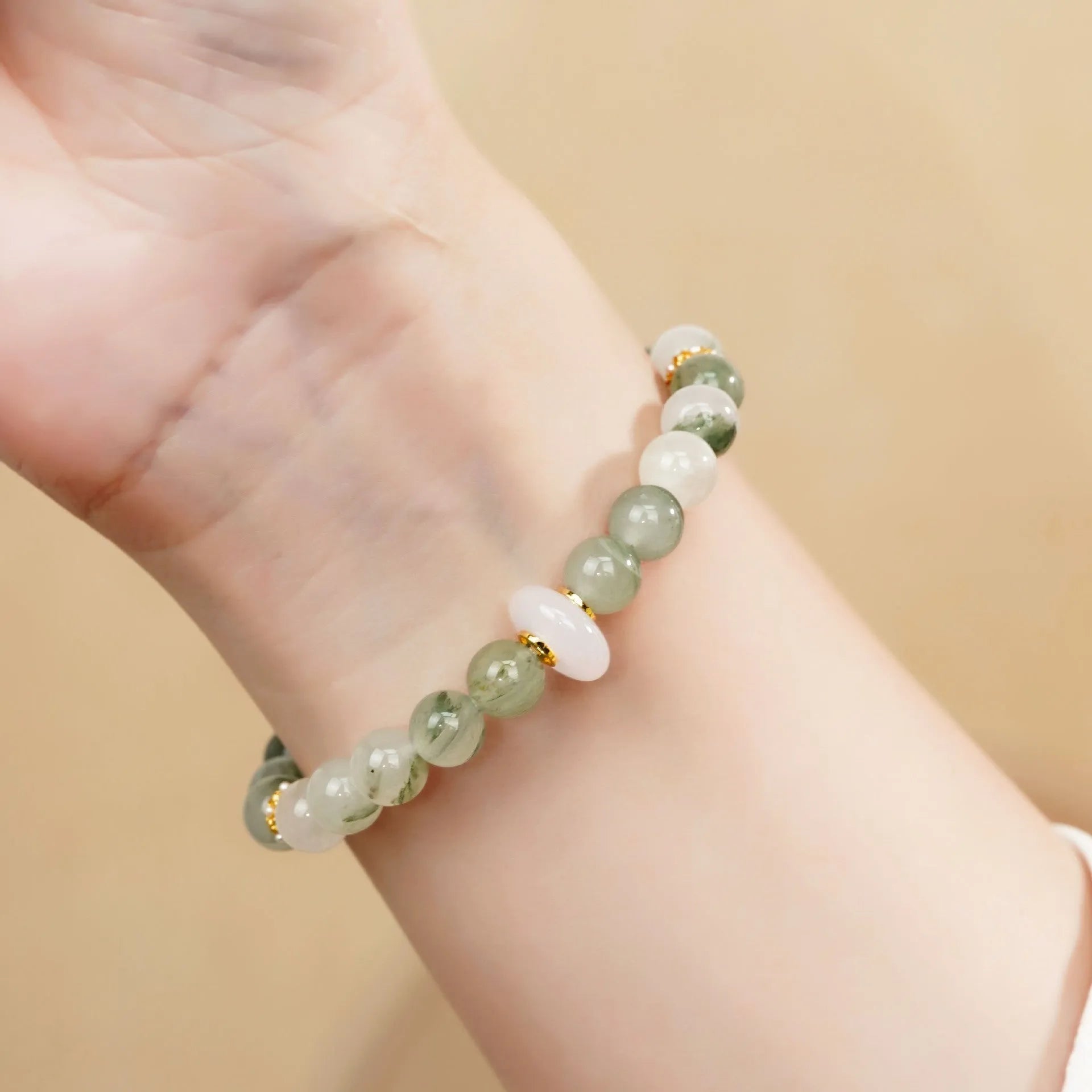 Light green Tian Shan Cui jade women's half bracelet with floating flower girl design in Chinese folk style.
