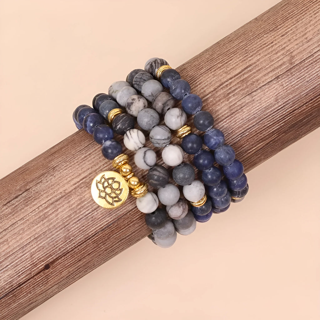 Blue multi-layer bracelet with patterned network stone beads and alloy metal components