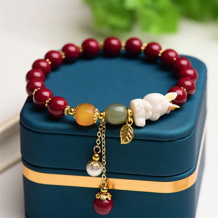 Natural beeswax purple gold sand cinnabar bracelet with rabbit bead design for women