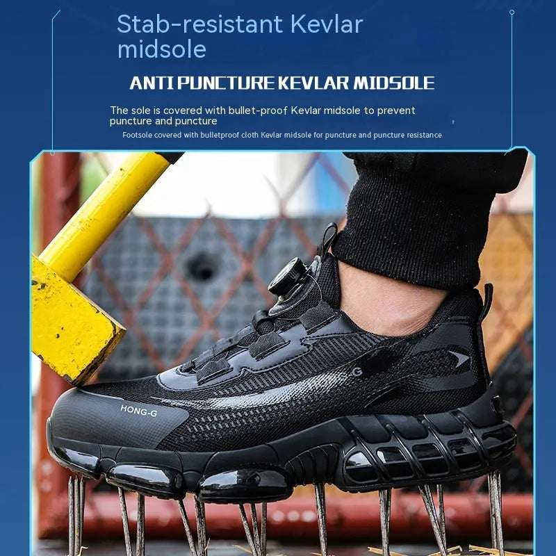 Lightweight black anti-smash work shoes with a steel toe cap and breathable Flyweave upper on a worksite.
