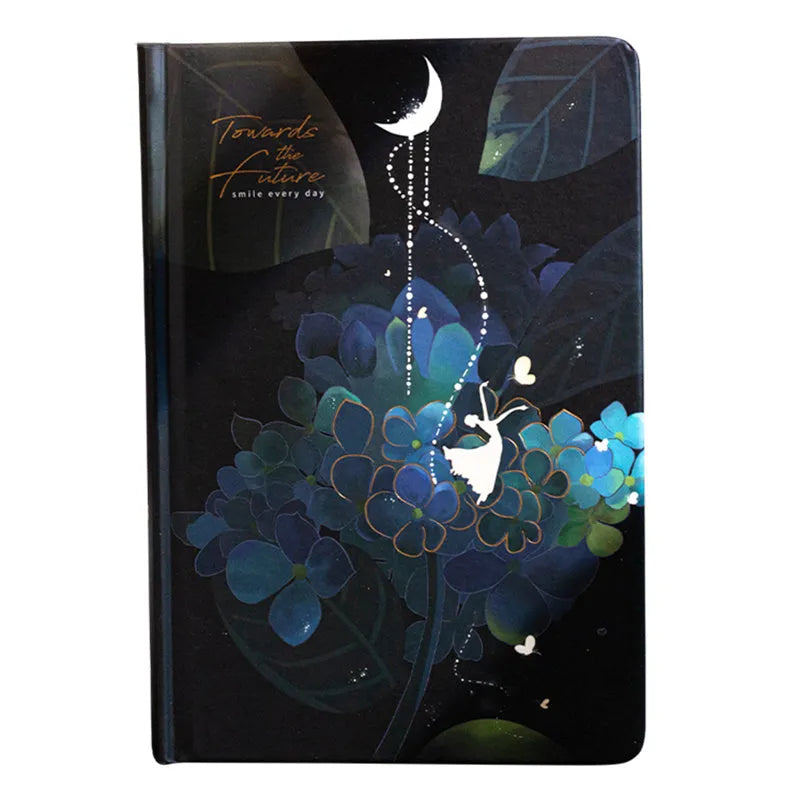 A5 notebook with luminous cover open to show colour illustrated pages, available in four colours.