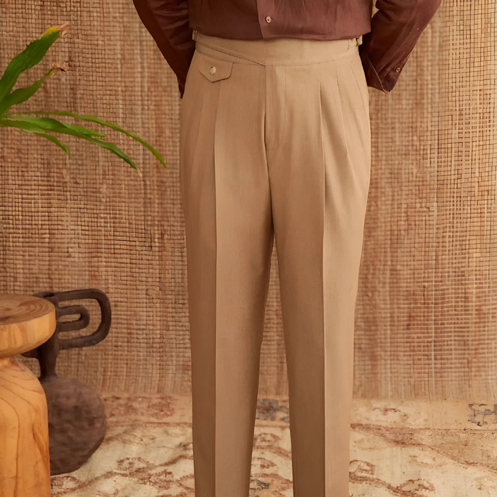 Men's slim fit straight leg trousers in wrinkle-resistant polyester fabric on a hanger.