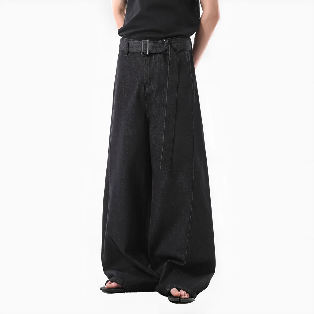 Black straight leg jeans with high waist and subtle gold metallic details, zip fly fastening