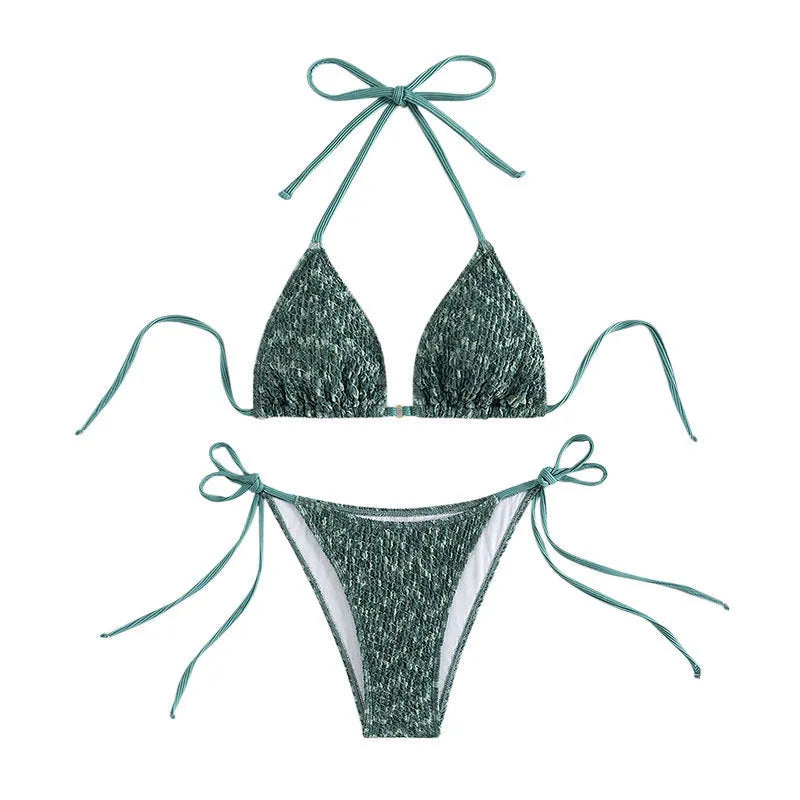 Women's green halter strap backless swimsuit bikini with three-point neck design on mannequin