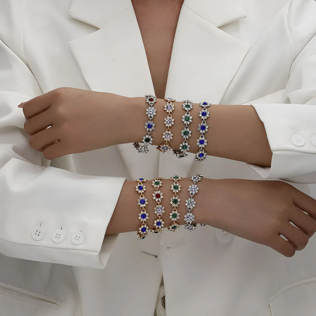 Flower-shaped bracelet with gemstone accents in gold or silver electroplated finish showing twelve colour combination options