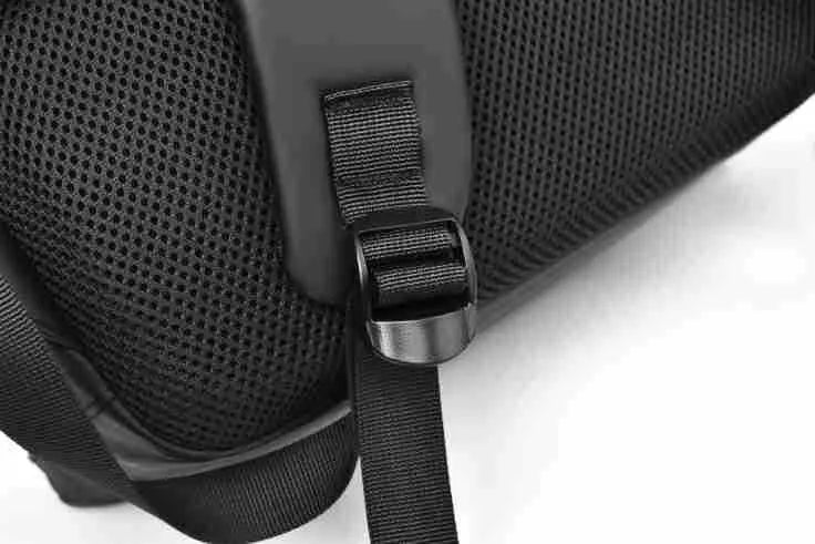 Large waterproof backpack in PU leather available in black, blue, or grey colours