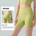 Women's high elastic yoga shorts in leaf green colour with high waist and anti-exposure design for summer workouts
