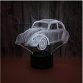 Modern 3D colourful LED table lamp with acrylic shade and remote control on desk