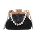 Women's straw woven shoulder bag with pearl chain trim showing internal compartments